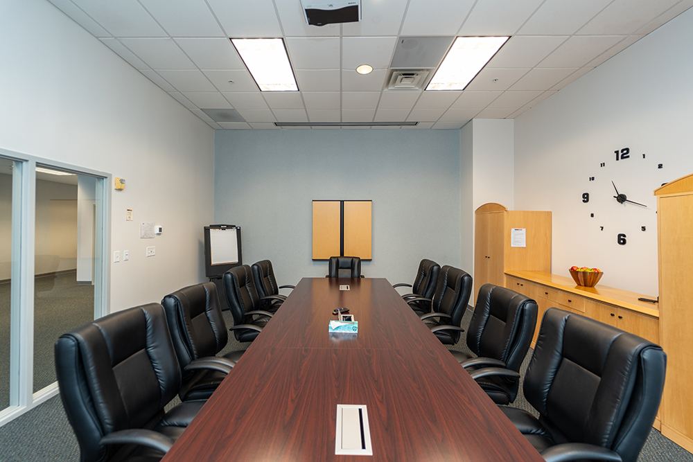 ten-person boardroom with projector in aston pa